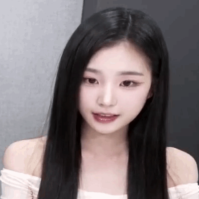 Close Up Of Woman With Long Black Hair In White Top GIF