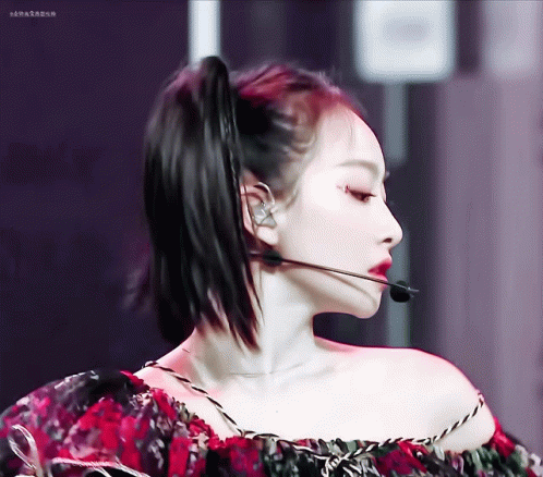 Close Up of Woman With Microphone in Ear