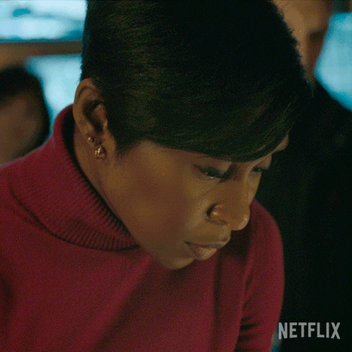 Close Up of Woman With Netflix Logo