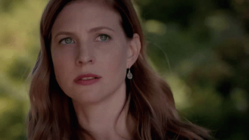 Close Up Of Woman With Serious Look GIF