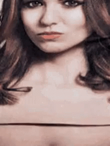 Close Up Of Woman With Slight Smirk GIF