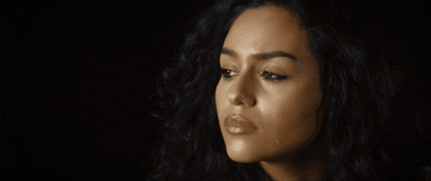 Close Up of Woman With Tear Coming Out of Eye