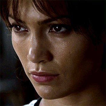 Close Up of Woman With Tear Running Down Cheek