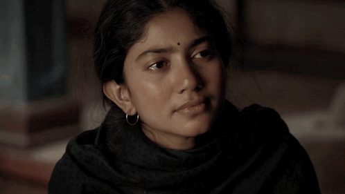 Close Up of Woman With Tear Running Down Face