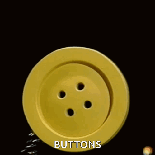 Close Up of Yellow Button With Buttons Below