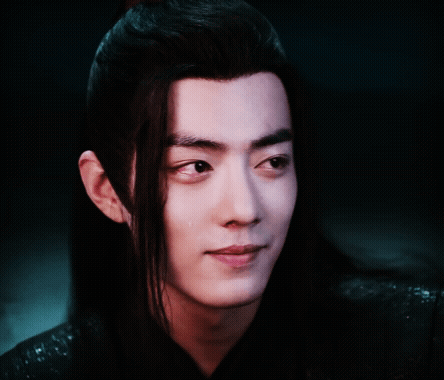 Close Up Of Young Man With Long Black Hair GIF