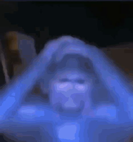 Close Up Person Face Dark Room Blue Background