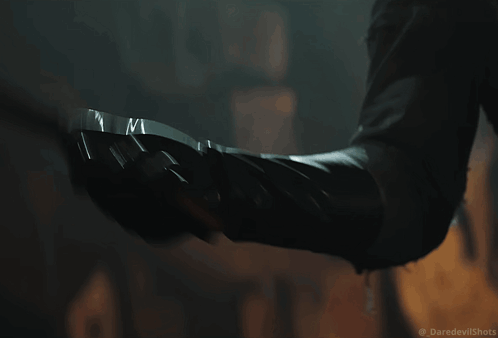 Close Up Person's Arm With Daredevil Shots