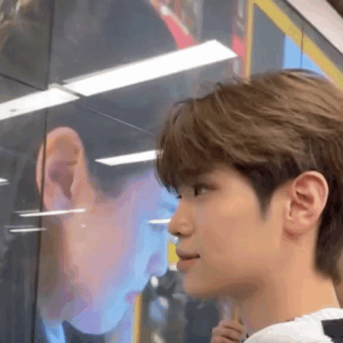 Close Up Person's Face Another's Reflection Mirror