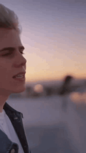 Close Up Person's Face With Sunset GIF