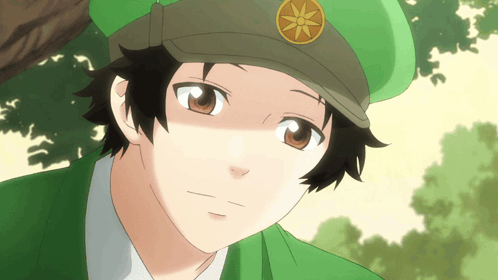 Close Up Person Wearing Green Hat GIF