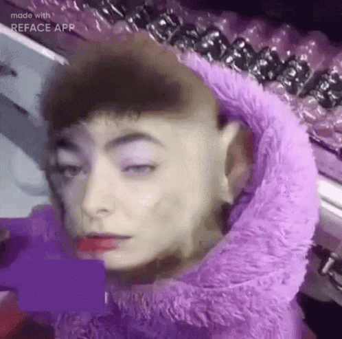 Close Up Person Wearing Purple Wig GIF