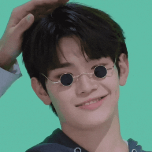 Close Up Person Wearing Round Sunglasses