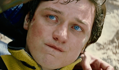 Close Up Person With Blue Eyes And Yellow Jacket GIF