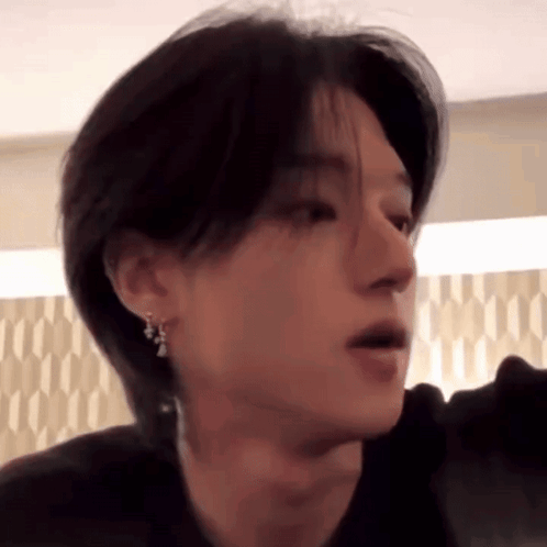 Close-Up Person With Ear Piercing