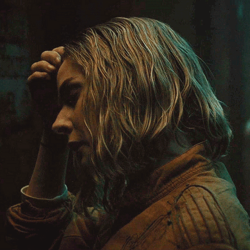 Close Up Person With Hand on Forehead