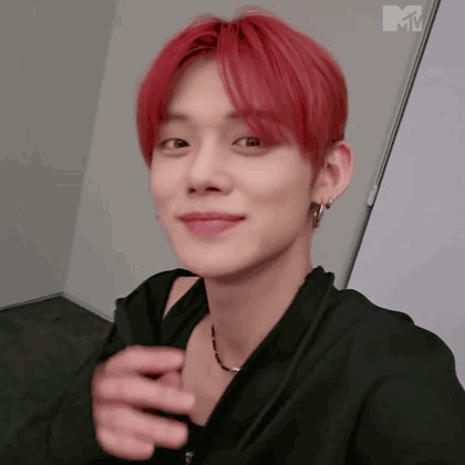 Close-Up Person With Red Hair and Black Jacket