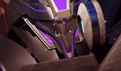 Close Up Robot Head With Purple Lights GIF