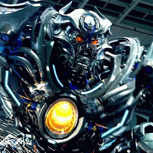 Close Up Robot With Red Eyes and Yellow Light