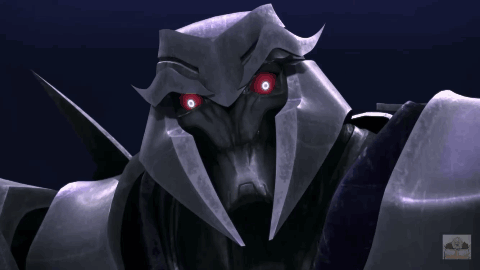 Close Up Robot With Red Eyes Transformers