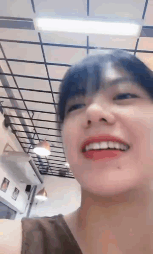 Close Up Smiling Face With Ceiling Background