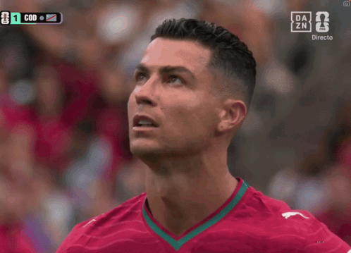 Close Up Soccer Player Face With DAZN Logo