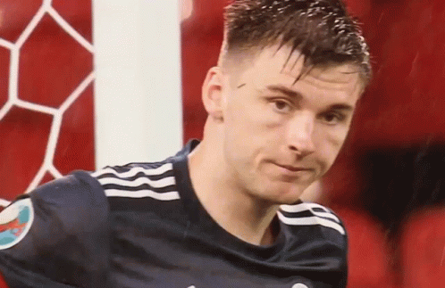 Close Up Soccer Player In Black Jersey GIF