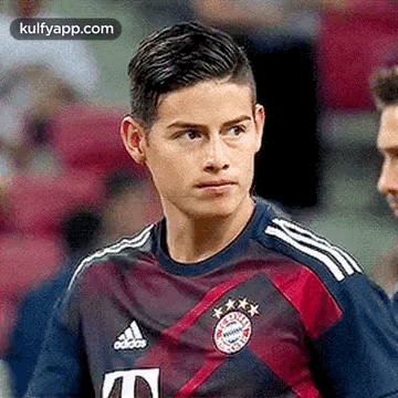 Close Up Soccer Player in Blue and Red Jersey