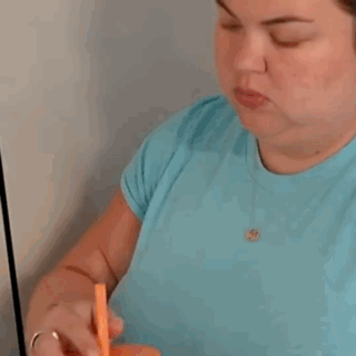 Close Up Woman Blue Shirt Earrings GIF