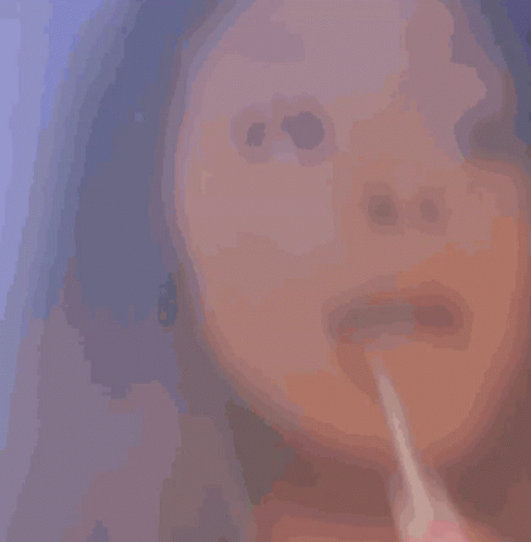 Close Up Woman Brushing Teeth