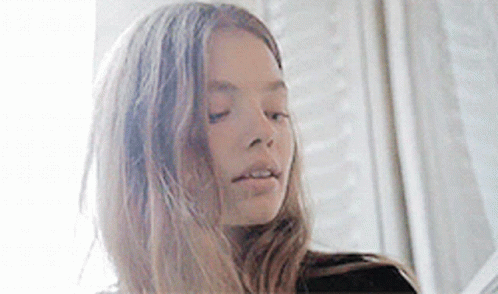 Close-Up Woman Eyes Closed Hair Blowing