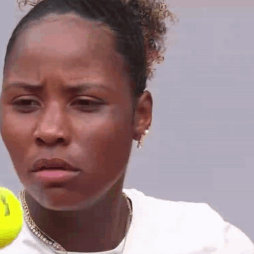 Close Up Woman Face With Tennis Ball