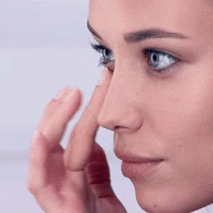 Close Up Woman Finger on Nose