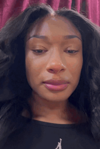 Close Up Woman In Black Shirt With Letter R GIF