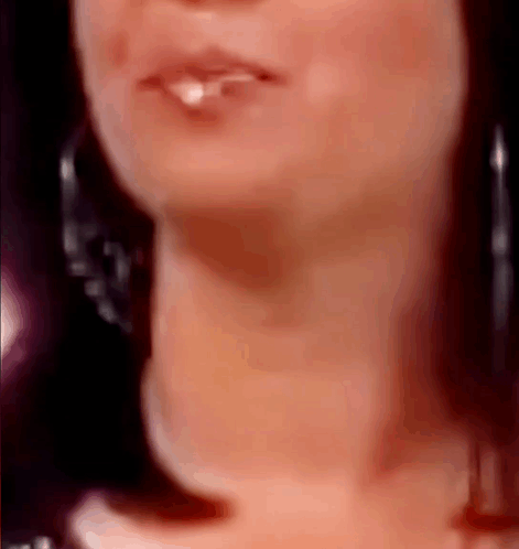 Close Up Woman Mouth and Neck With Earrings