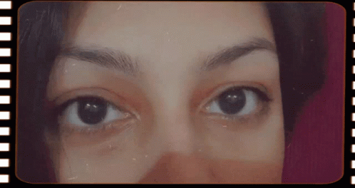 Close Up Woman's Eyes in Film Strip Frame