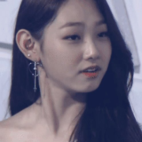 Close Up Woman's Face With Earrings GIF