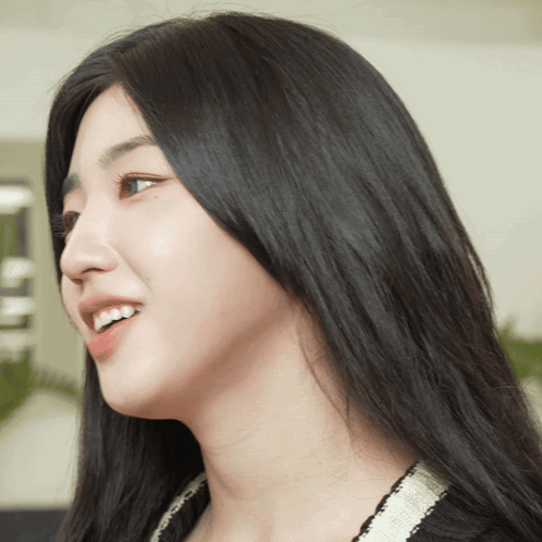 Close Up Woman's Face With Long Hair GIF