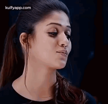 Close Up Woman Serious Face Black Background GIF