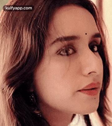 Close Up Woman With Bindi Looking At Camera GIF