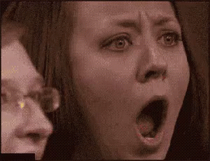 Close Up Woman With Mouth Open Man Behind GIF