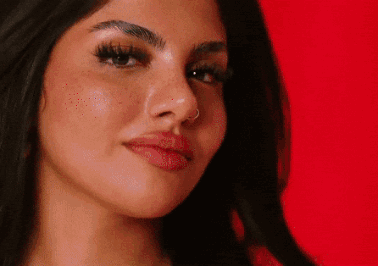 Close Up Woman with Nose Ring Red Background