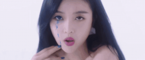 Close Up Woman With Tear Running Down Face