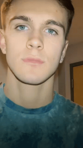Close Up Young Man in Blue Shirt