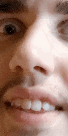 Closed Up White Guy Blinking Reaction GIF