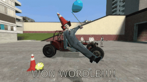 Clown Holding Blue Balloon Says Won Wordle GIF