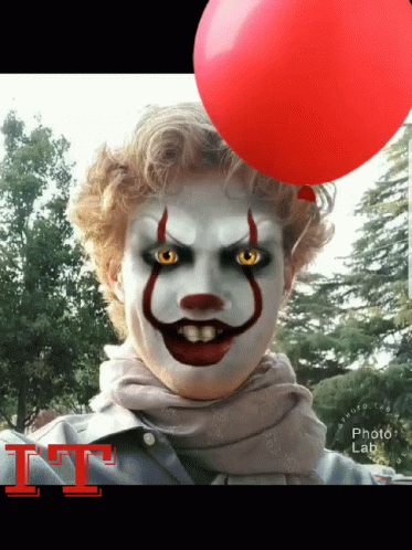 Clown Holding Red Balloon With Letter I GIF