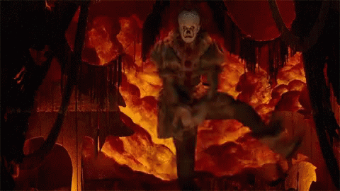Clown in Cave With Fire