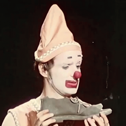 Clown Shoes Sad Clown Holding Shoe GIF