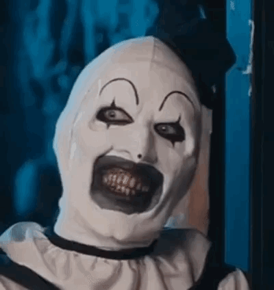 Clown Wearing Mask With Huge Smile